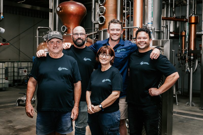 The SOLLOS team at the distillery